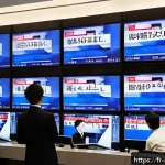 히가시데 마사히로 스캔들 - A dramatic newsroom scene in Tokyo with multiple large screens showing breaking news headlines about...